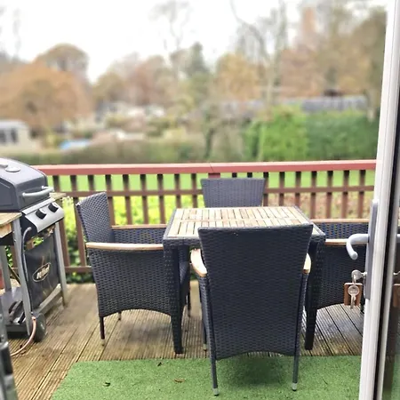 By The - District - Hot Tub