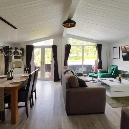 By The - District - Hot Tub