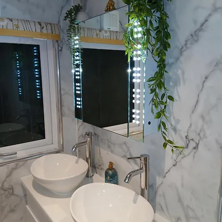 By The - District - Hot Tub *